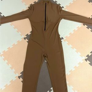 Super stretchy half zip jump suit